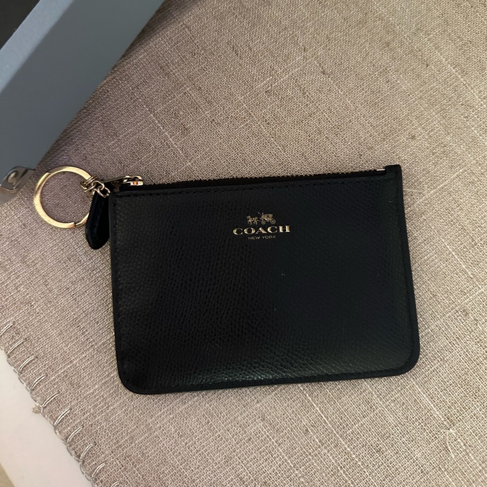 Mini black Coach pouch for keychain.